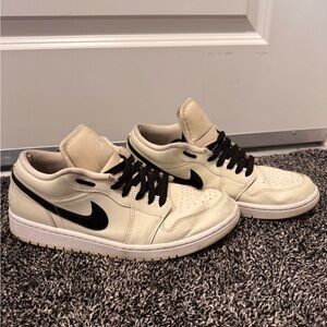 Jordan Women’s Off-White and Black Sneakers